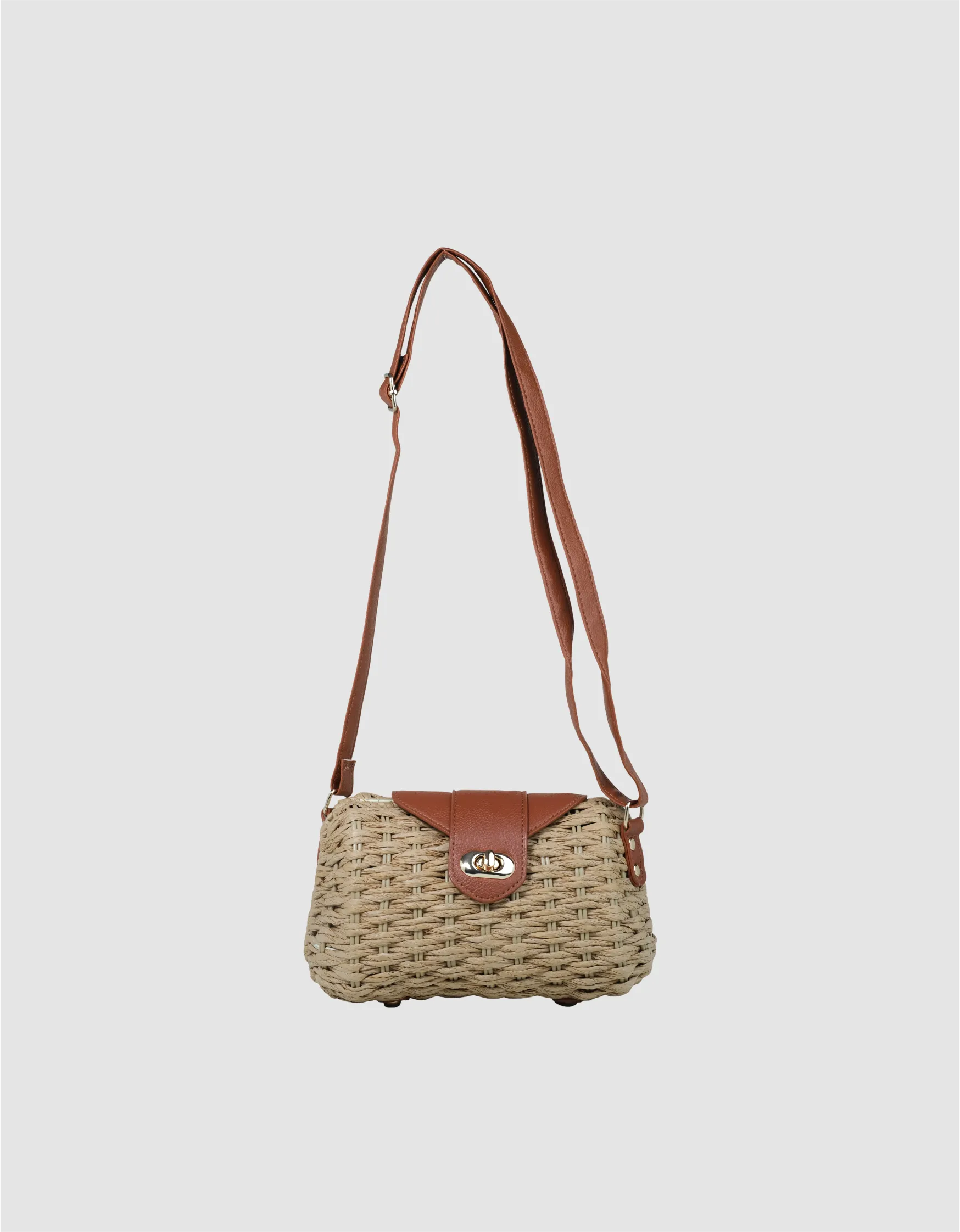 Beach Glow sling bag for women — trendy summer handbag with woven texture and strap.
